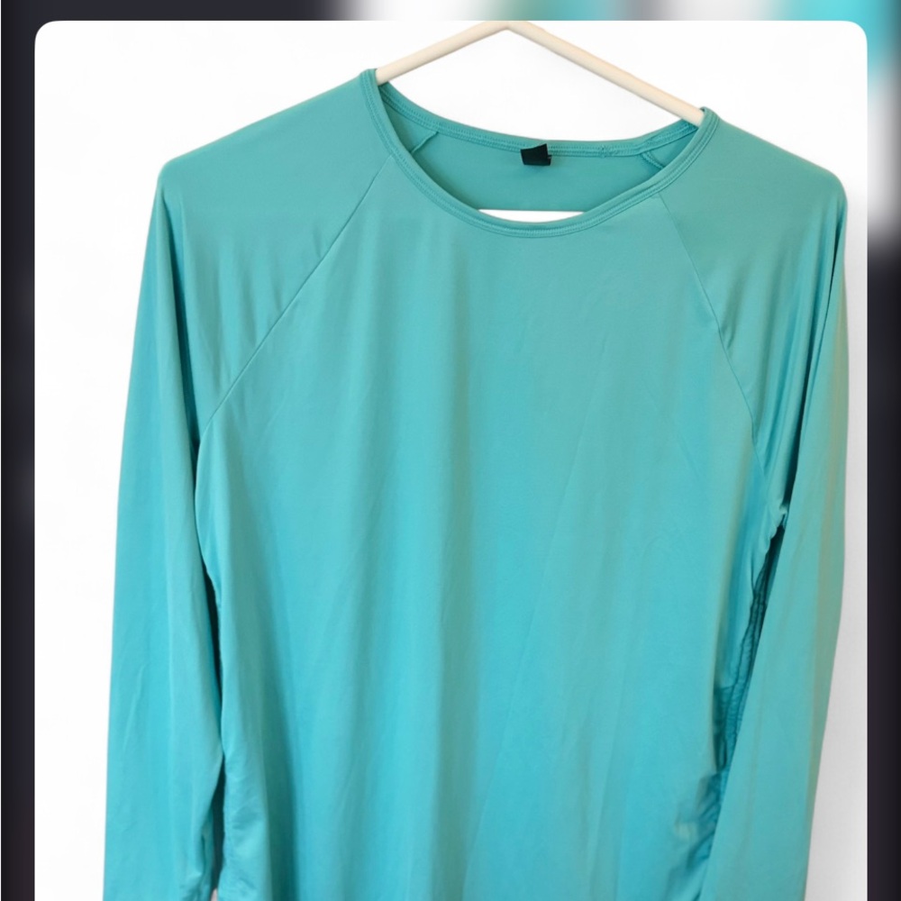 Under Armour Women's Long-Sleeve Performance Tee in Teal Blue